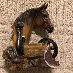 Horse head figurine